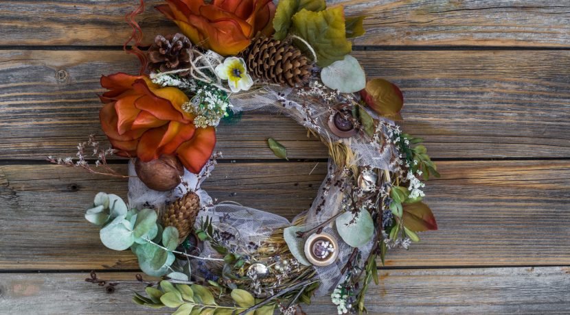 autumn wreath on wooden background in the form of a circle