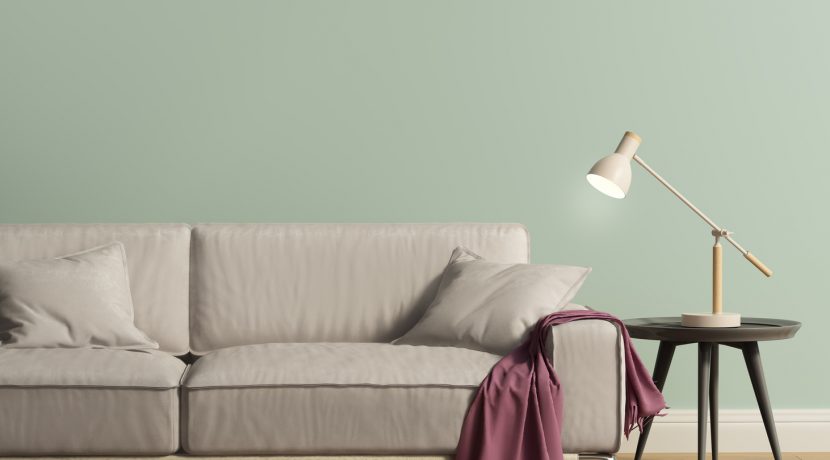 Grey sofa in a contemporary modern mint interior